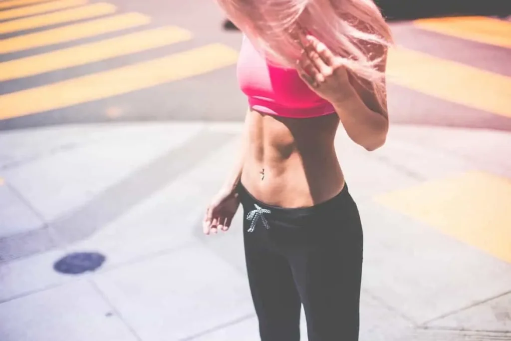 Woman with toned stomach after LA-EMS Body Sculpting Treatment West Midlands